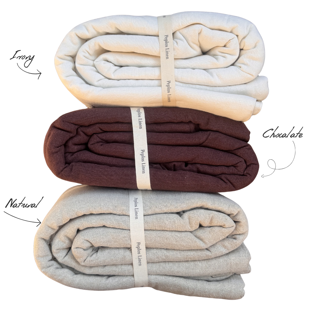 3 folded linen quilts in three colors ivory, natural and chocolate
